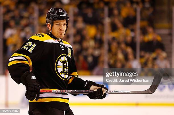 Andrew Ference of the Boston Bruins plays against the New York Rangers during the season opener game on January 19, 2013 at TD Garden in Boston,...
