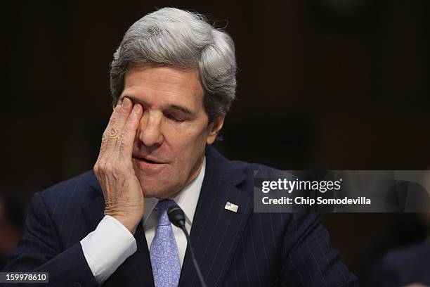 Sen. John Kerry testifies during his confirmation hearing before the Senate Foreign Relations Committee to become the next Secretary of State in the...