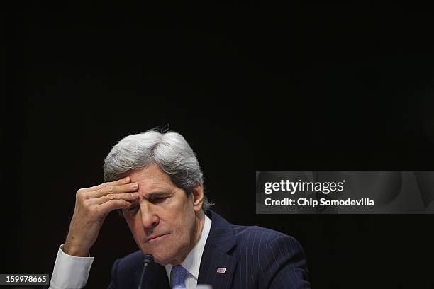 Sen. John Kerry testifies during his confirmation hearing before the Senate Foreign Relations Committee to become the next Secretary of State in the...