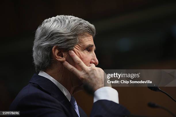 Sen. John Kerry testifies during his confirmation hearing before the Senate Foreign Relations Committee to become the next Secretary of State in the...