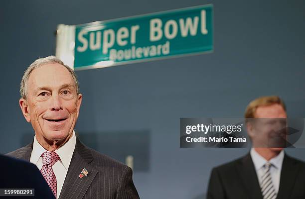 New York City Mayor Michael Bloomberg speaks as National Football League Commissioner Roger Goodell looks on at a City Hall press conference...