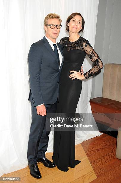 Simon Baker and Minnie Driver attend the European Premiere of 'I Give It A Year' at Vue West End on January 24, 2013 in London, England.