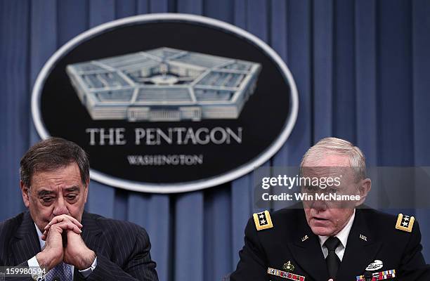 Defense Secretary Leon Panetta and Chairman of the Joint Chiefs of Staff General Martin Dempsey answer questions after signing orders that will lift...