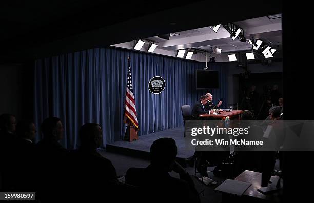 Defense Secretary Leon Panetta and Chairman of the Joint Chiefs of Staff General Martin Dempsey answer questions after signing orders that will lift...