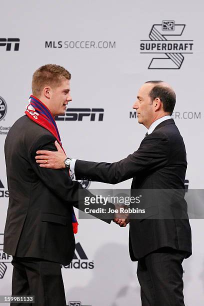 Walker Zimmerman of Furman shakes hands with commissioner Don Garber after being selected by FC Dallas as the seventh overall pick in the 2013 MLS...