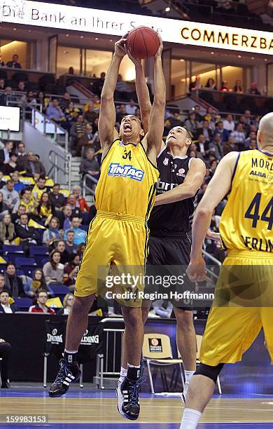 Yassin Idbihi, #34 of Alba Berlin competes with Maik Zirbes, #33 of Brose Baskets Bamberg during the 2012-2013 Turkish Airlines Euroleague Top 16...