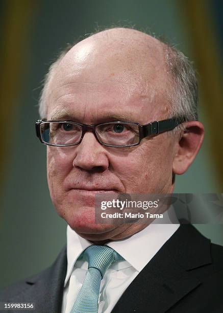 New York Jets owner Woody Johnson looks on at a City Hall press conference announcing plans for Super Bowl XLVIII in the region on January 24, 2012...