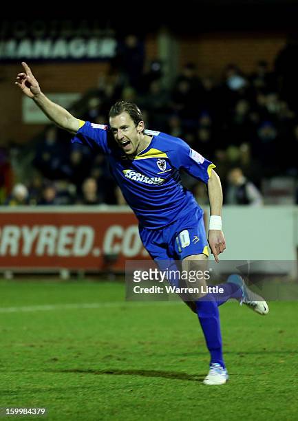 Jack Midson of AFC Wimbledon celebrates scoring the opening goal during the npower League Two match between AFC Wimbledon and Port Vale at The Cherry...
