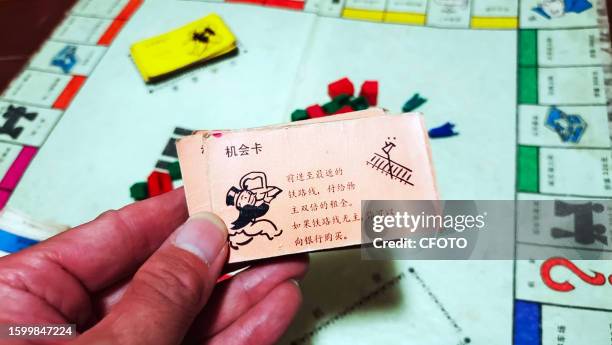 View of the classic old game Monopoly in Shanghai, China, August 14, 2023. Players split the game's money, buy real estate and build buildings to...