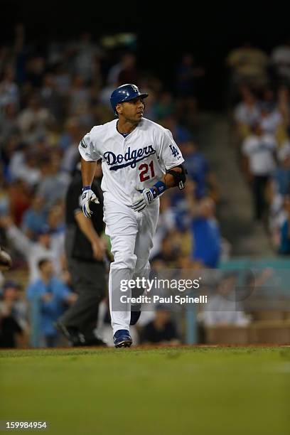 Juan Rivera of the Los Angeles Dodgers runs the bases after hitting a two run home run in the bottom of the eighth inning during the game against the...
