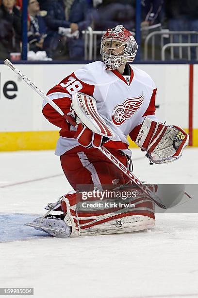 Tom McCollum of the Detroit Red Wings warms up prior to the start of the game against the Columbus Blue Jackets on January 21, 2013 at Nationwide...