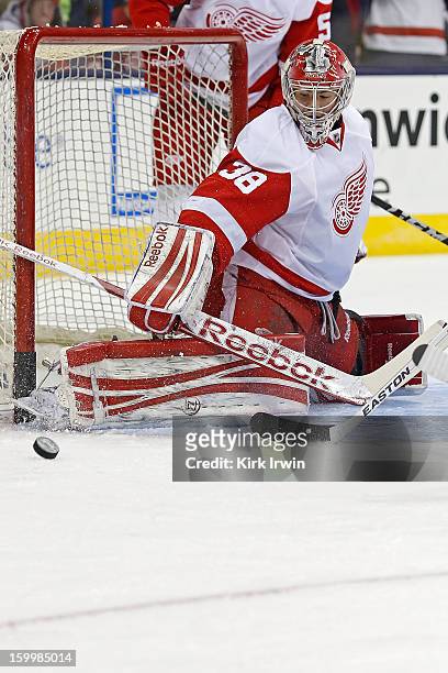Tom McCollum of the Detroit Red Wings warms up prior to the start of the game against the Columbus Blue Jackets on January 21, 2013 at Nationwide...