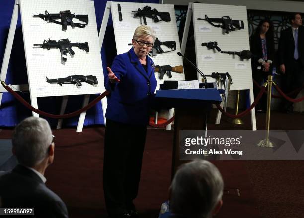 Representative Carolyn McCarthy speaks next to a display of assault weapons during a news conference January 24, 2013 on Capitol Hill in Washington,...