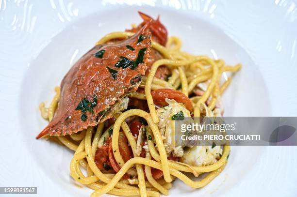 Picture of a dish of pasta with blue crab meat harvested in the Scardovari lagoon, taken at Chef Luca Faraon's holiday farm restaurant in Eraclea,...