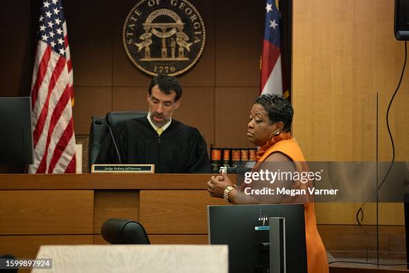 Fulton County Superior Court Judge Robert McBurney receives documents Fulton County Superior Court Judge Robert McBurney receives documents