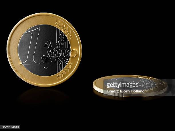 illustrazioni stock, clip art, cartoni animati e icone di tendenza di euro coins on reflective black background - european union coin