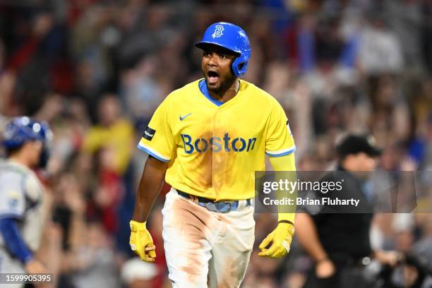 Pablo Reyes of the Boston Red Sox reacts after hitting a walk-off grand slam in the ninth inning against the Kansas City Royals at Fenway Park on...