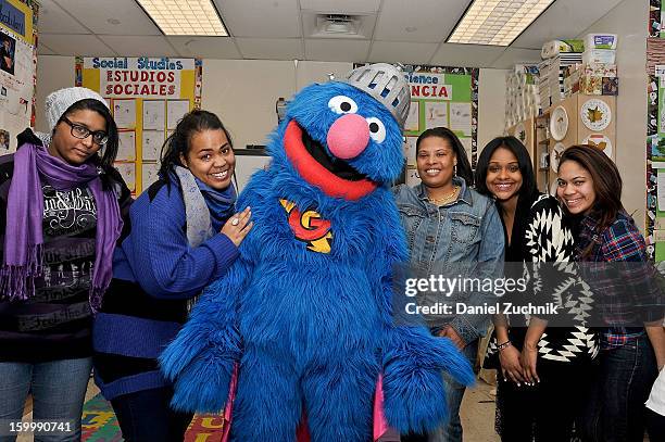 Super Grover teaches kids to be a super hero at the WHEDCo classroom on January 24, 2013 in New York City.