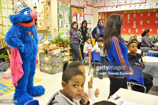 Super Grover teaches kids to be a super hero at the WHEDCo classroom on January 24, 2013 in New York City.