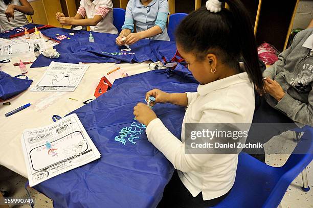 Super Grover teaches kids to be a super hero at the WHEDCo classroom on January 24, 2013 in New York City.