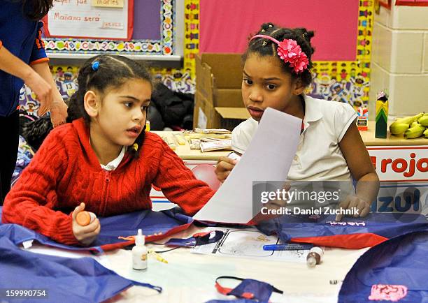 Super Grover teaches kids to be a super hero at the WHEDCo classroom on January 24, 2013 in New York City.