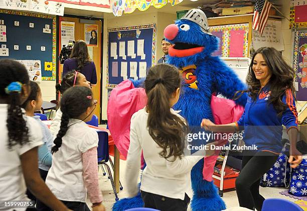 Super Grover teaches kids to be a super hero at the WHEDCo classroom on January 24, 2013 in New York City.