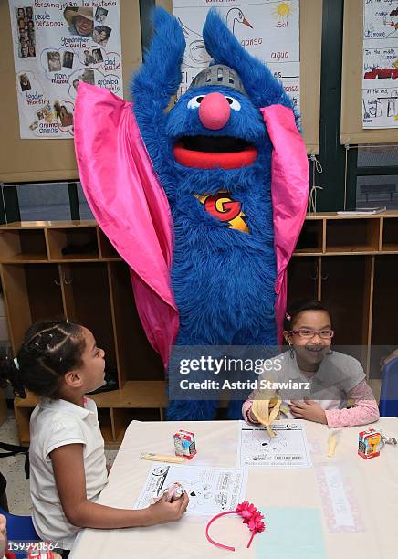 Sesame Street Live's Super Grover teach children from WHEDCo how to be super heroes on January 24, 2013 in New York City.