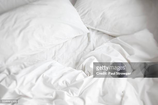 white bed sheets - bedding stock pictures, royalty-free photos & images