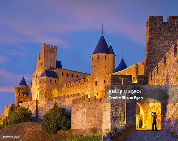 france, languedoc, carcassonne, aude gate - guy carcassonne stock pictures, royalty-free photos & images