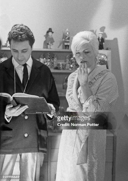 Michael Winner directs English actress Diana Dors in a bedroom scene for the crime drama 'West 11', London, 28th January 1963.