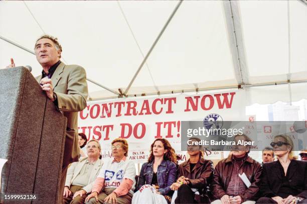 American actor Judd Hirsch speaks from a lectern during a joint SAG-AFTRA protest in Bryant Park, New York, New York, June 14, 2000. Among those...