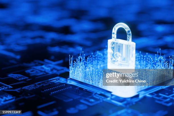 security padlock and circuit board - network security stock pictures, royalty-free photos & images