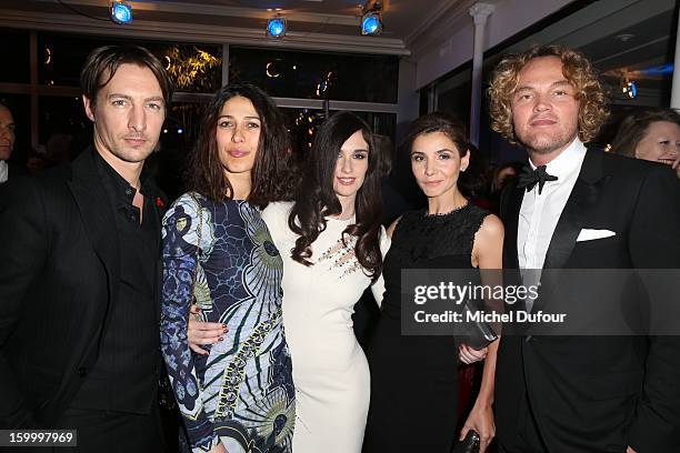 Benn Northover, Olivia Magnani, Paz Vega, Clotilde Courau and Peter Dundas attend the Sidaction Gala Dinner 2013 at Pavillon d'Armenonville on...