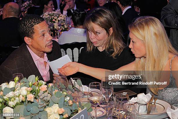 JoeyStarr, guest and Isabelle Doval attend the Sidaction Gala Dinner 2013 at Pavillon d'Armenonville on January 24, 2013 in Paris, France.