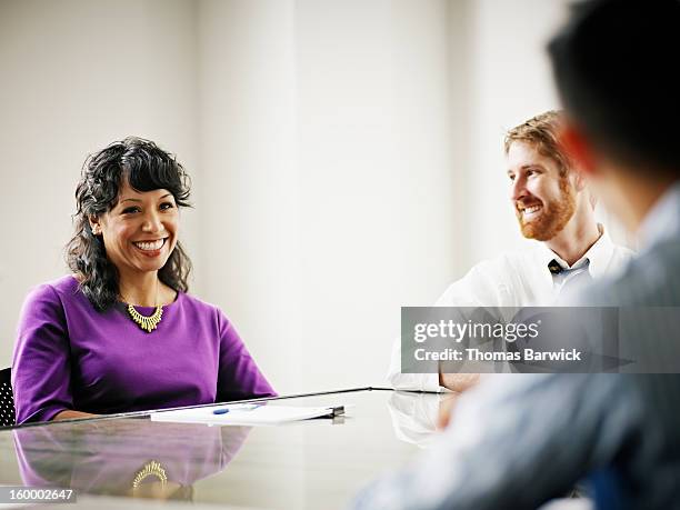 group of coworkers in discussion in office - conference 2012 day 3 stockfoto's en -beelden