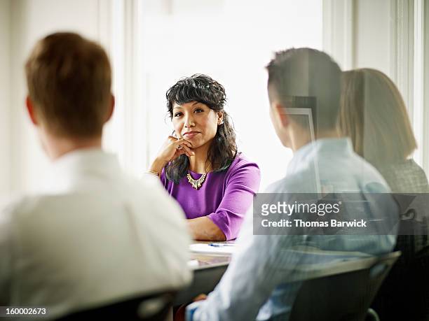 businesswoman leading discussion with coworkers - native korean stock pictures, royalty-free photos & images