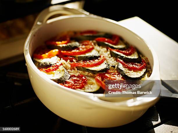 organic zucchini and tomato casserole - ovenschotel stockfoto's en -beelden