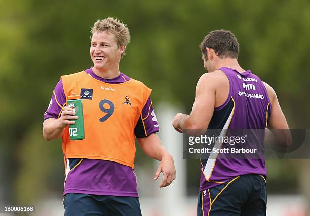 Brett Finch and Cameron Smith of the Storm look on during a Melbourne Storm NRL training session at Gosch's Paddock on January 25, 2013 in Melbourne,...