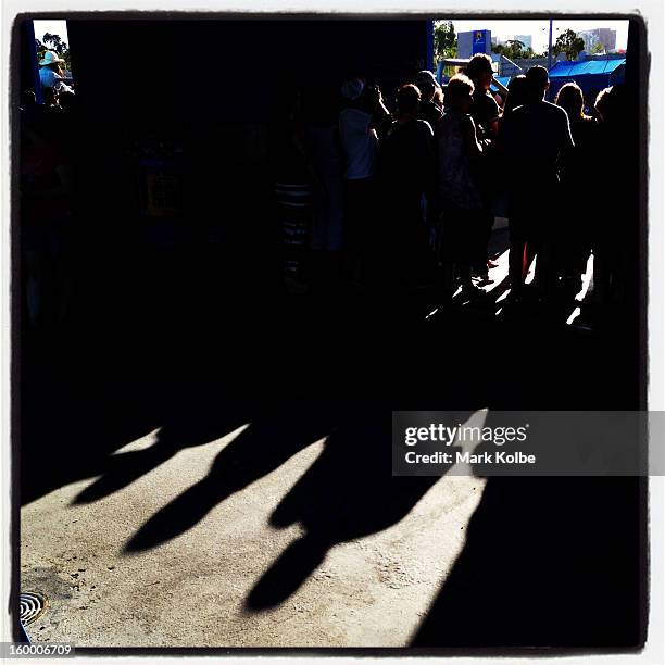 Crowds watch the action as they wait for seats on Magaret Court Arena during day six of the 2013 Australian Open at Melbourne Park on January 19,...