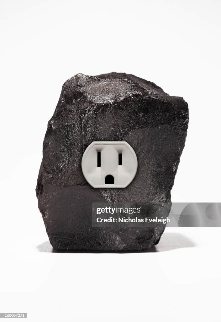 Black coal with electrical outlet