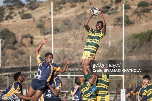 Thando Licenga from Soweto Jabulani Technical Secondary School U16 rugby team jumps for the ball during a match against Marist Brothers Linmeyer...