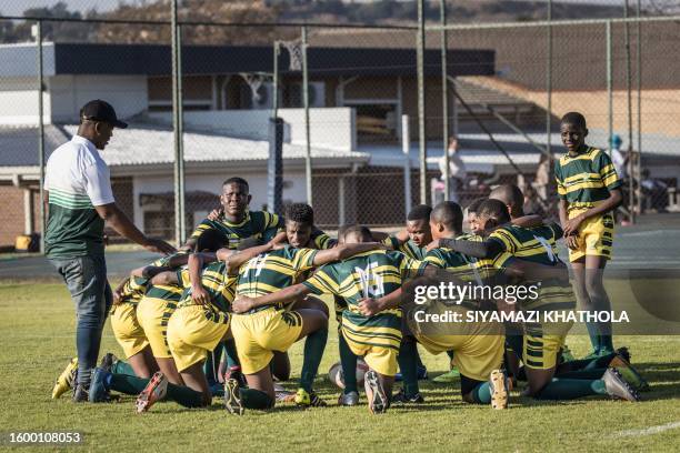 Soweto Jabulani Technical Secondary School U16 rugby team players huddle ahead of a match against Marist Brothers Linmeyer School in Johannesburg on...