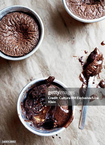 pots of baked chocolate dessert - souffle stock pictures, royalty-free photos & images