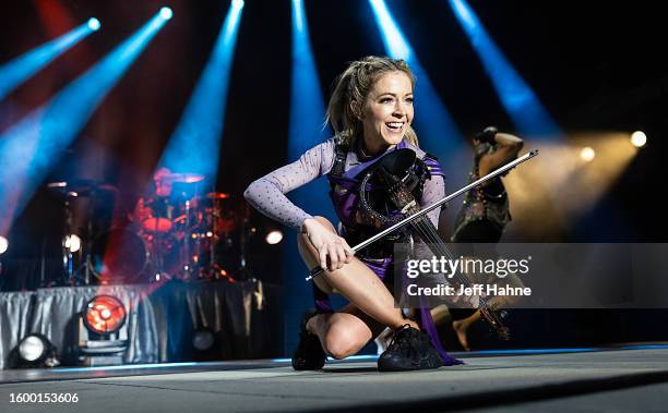 Lindsey Stirling performs at Skyla Credit Union Amphitheatre on August 07, 2023 in Charlotte, North Carolina.