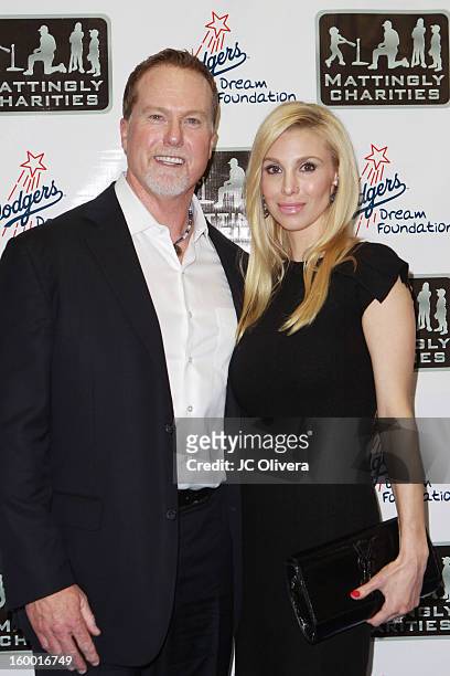Former Baseball Player Mark McGwire and wife Stephanie Slemer attend A Night of Entertainment with Don Mattingly hosted by George Lopez at Sports...