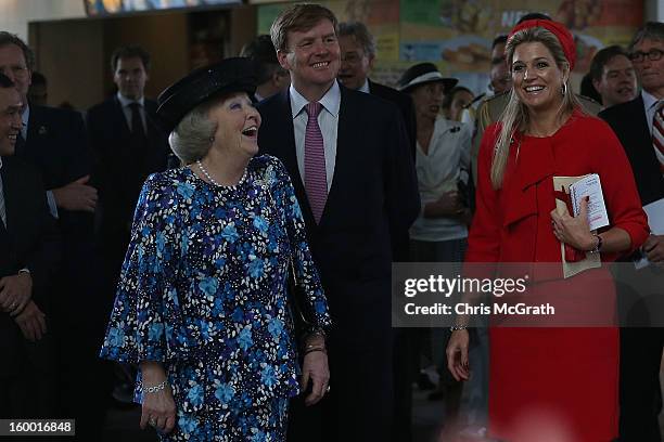 Queen Beatrix of the Netherlands, Prince Willem-Alexander and Princess Maxima react as dutch students from the Hollandse School sing a dutch song...