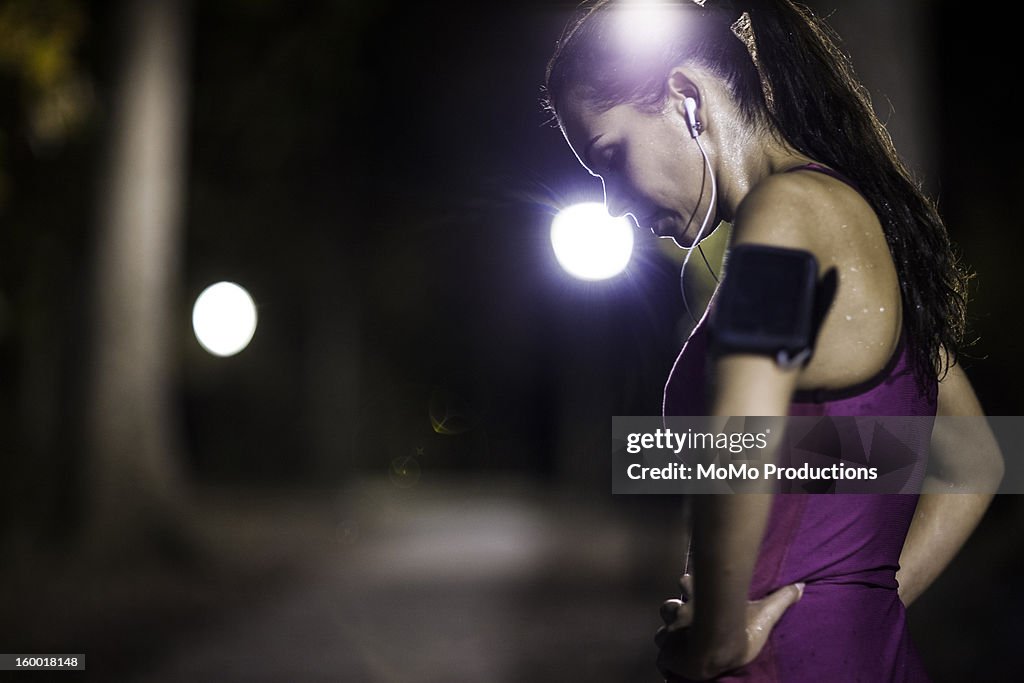 Woman running at nighttime