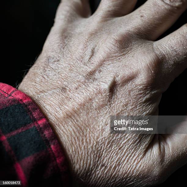 close-up of senior's hand - human joint stock pictures, royalty-free photos & images