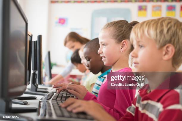 Child At Computer 845 Children Working On Computer Stock Photos, High-Res Pictures, and ...