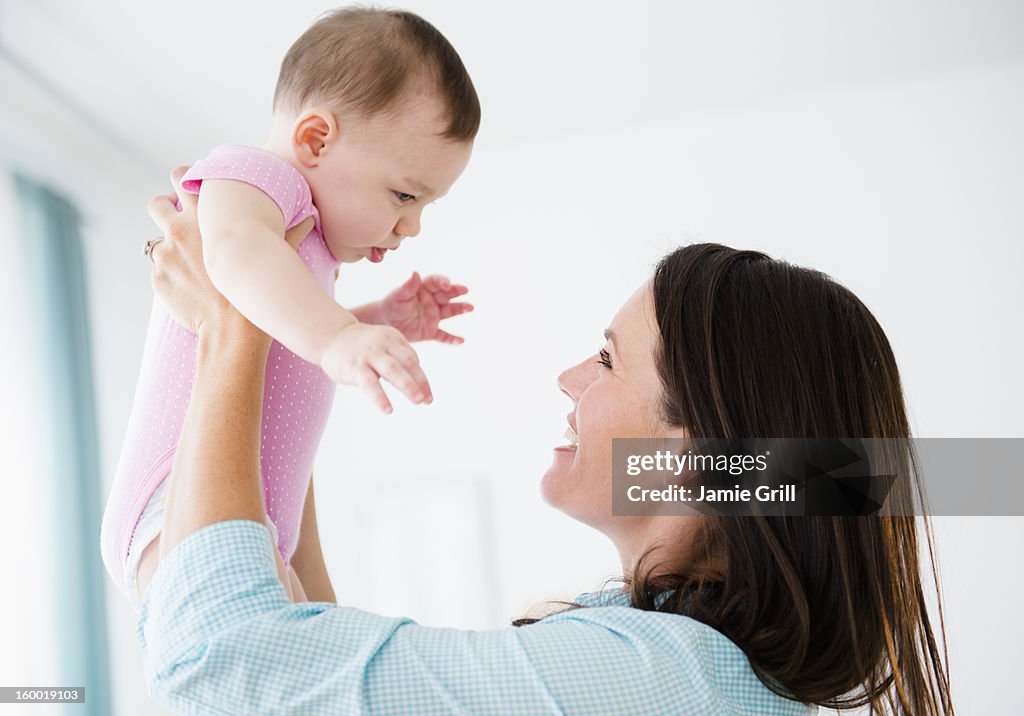 Mother with daughter (6-11 months)